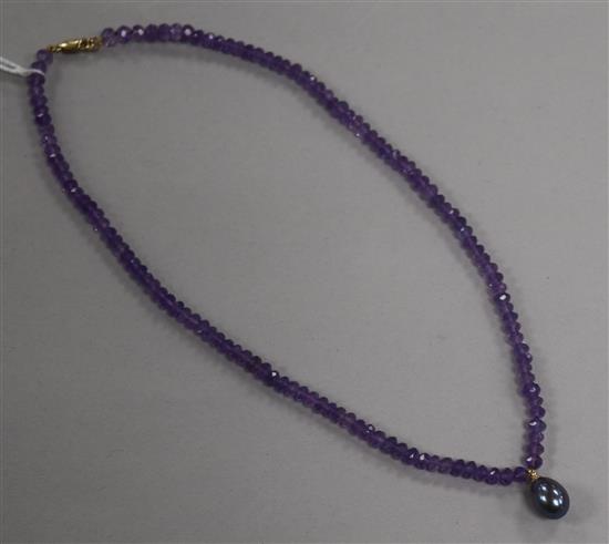 A single strand facetted amethyst bead necklace with Tahitian cultured pearl drop and 9ct gold clasp, approx. 38cm.